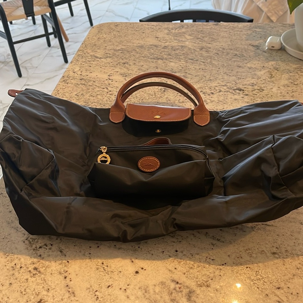 Long champ weekend bag with toiletries bag